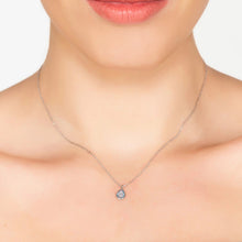 Woman Wearing Silver & Blue Topaz Teardrop Pendant Necklace Close U