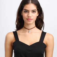 Woman Wearing Double Rope Choker and Leaf Pendant