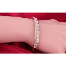 Woman Wearing Rose Gold Bangle with Embedded Austrian Crystals