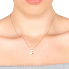 Woman Wearing Capricorn Zodiac Necklace