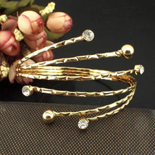 Diverging Bangle and Rhinestones Bracelet