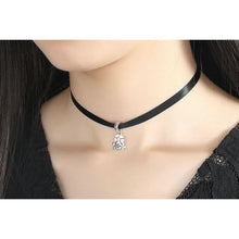 woman wearing black choker necklace 925 silver chain attachment pink flower pendant