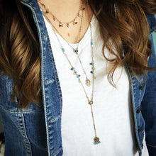 Woman Wearing Triple Layer Necklace